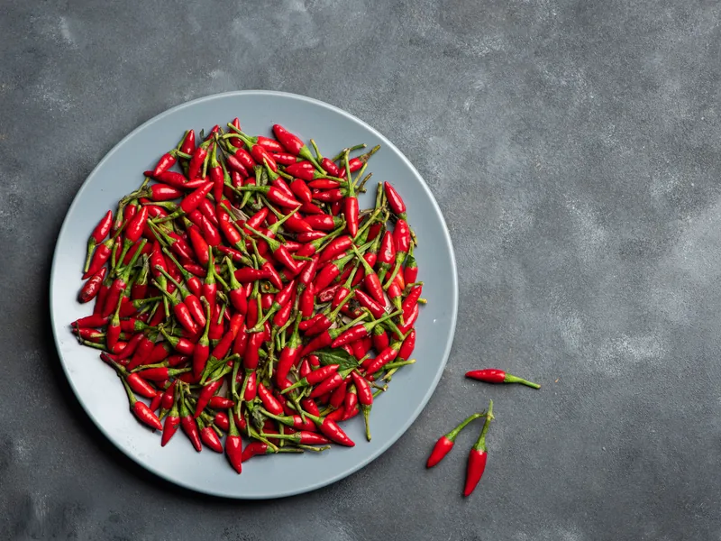 A plate of small red Thai chillies