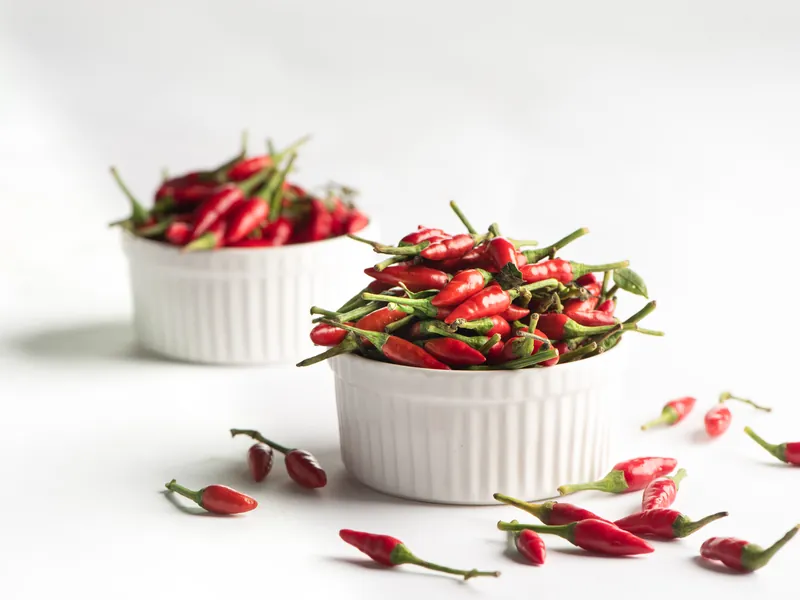 Red Thai chillies in small white bowls